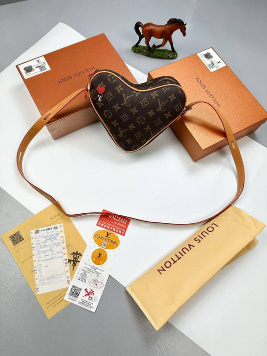 Louis Vuitton Women Coeur Game On Love Bag Fake Reps Sale UK	Woman First Copy Cheap Price Fakes Replica Handbag Women's Luxury Reps Leather Belt Minibag 1st Copies Rep Heart Shape Bags Ladies 1:1 LV Brand Logo AAA Duplicate Brown